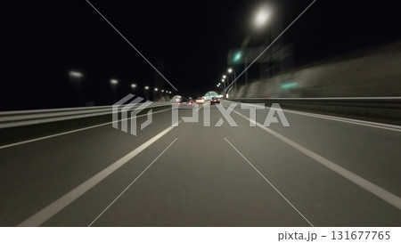 Car driving on highway and tunnel at night Car driving on highway and tunnel at night 131677765