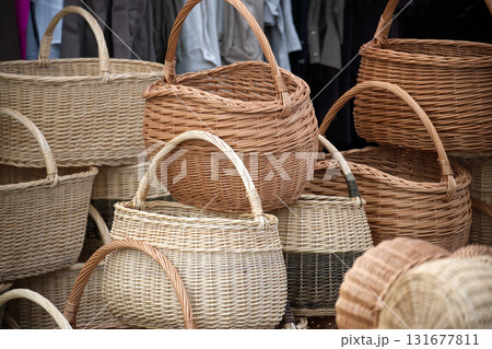 Assorted Woven Baskets Displayed in Market Stall for Home Decor and Storage 131677811