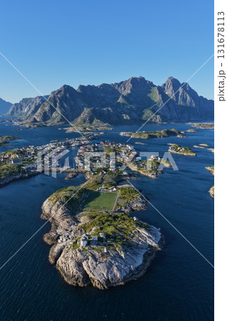 Henningsvaer village and football pitch in lofoten, norway Henningsvaer village and football pitch in lofoten, norway 131678113