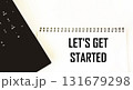 Let's start with the text on the notepad next to the laptop 131679298