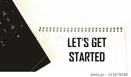 Let's start with the text on the notepad next to the laptop Let's start with the text on the notepad next to the laptop 131679298