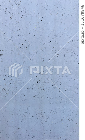 Surface texture of concrete with subtle speckles in bright daylight 131679946
