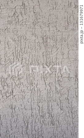 Freshly cut grass piled in sunlight at a garden in summer, showcasing vibrant green colors and texture 131679971