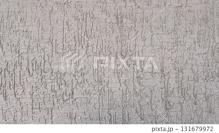 Freshly cut grass piled in sunlight at a garden in summer, showcasing vibrant green colors and texture 131679972