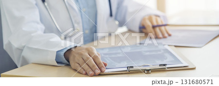 Banner hands of two women doctor medical lab discussing together healthcare teamwork. Panorama Two asian women doctors meeting write prescription medical clinic office using laptop with copy space. 131680571