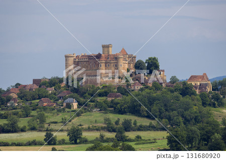 Castelnau Bressac castle standing on a hill in Occitanie, France 131680920