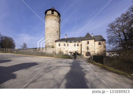 Litschau castle and watchtower with sun shadows across road 131680923