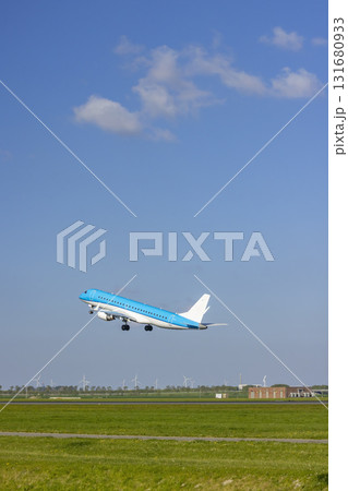 Jet airplane taking off from airport runway in Vijfhuizen 131680933