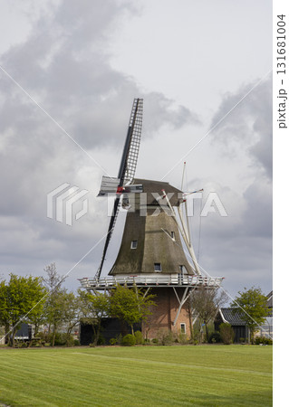 Traditional Dutch windmill in Peazens Friesland Netherlands Traditional Dutch windmill in Peazens Friesland Netherlands 131681004
