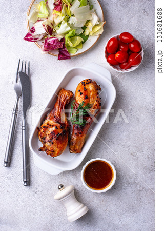 Roasted chicken drumsticks with vegetables Roasted chicken drumsticks with vegetables 131681688