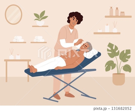 Acupuncture treatment concept. Acupuncture specialist performing facial needle therapy on an elderly patient at a wellness clinic. World Acupuncture Day. Acupuncture treatment concept. Acupuncture specialist performing facial needle therapy on an elderly patient at a wellness clinic. World Acupuncture Day. 131682052