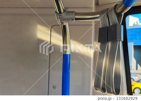 Fire safety equipment visible inside public transport vehicle during daytime 131682929