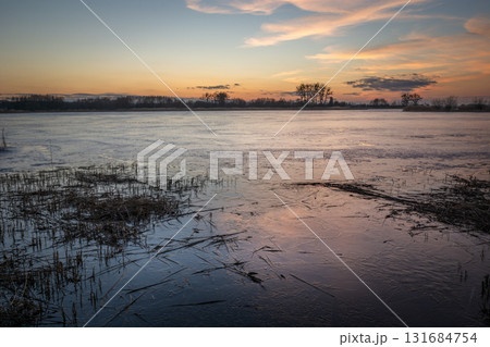 View of the frozen lake after sunset 131684754