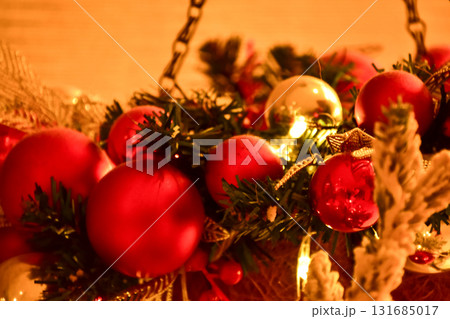 Close-up of the Christmas floral wreaths. Festive and home decoration. Winter season, winter festive. Christmas celebration, Xmas celebration. For background use. Close-up of the Christmas floral wreaths. Festive and home decoration. Winter season, winter festive. Christmas celebration, Xmas celebration. For background use. 131685017