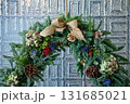 Close-up of the Christmas floral wreaths. Festive and home decoration. Winter season, winter festive. Christmas celebration, Xmas celebration. For background use. 131685021