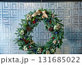 Close-up of the Christmas floral wreaths. Festive and home decoration. Winter season, winter festive. Christmas celebration, Xmas celebration. For background use. 131685022