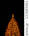 Close-up of the Christmas trees with colorful ornaments. Festive decoration. Full of ornaments. Winter season, winter festive. Christmas celebration, Xmas celebration. For background use. 131685061