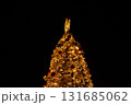 Close-up of the Christmas trees with colorful ornaments. Festive decoration. Full of ornaments. Winter season, winter festive. Christmas celebration, Xmas celebration. For background use. 131685062