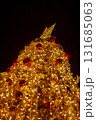 Close-up of the Christmas trees with colorful ornaments. Festive decoration. Full of ornaments. Winter season, winter festive. Christmas celebration, Xmas celebration. For background use. 131685063