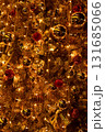 Close-up of the Christmas trees with colorful ornaments. Festive decoration. Full of ornaments. Winter season, winter festive. Christmas celebration, Xmas celebration. For background use. 131685066