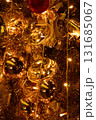 Close-up of the Christmas trees with colorful ornaments. Festive decoration. Full of ornaments. Winter season, winter festive. Christmas celebration, Xmas celebration. For background use. 131685067