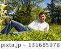 lying in the grass 131685978