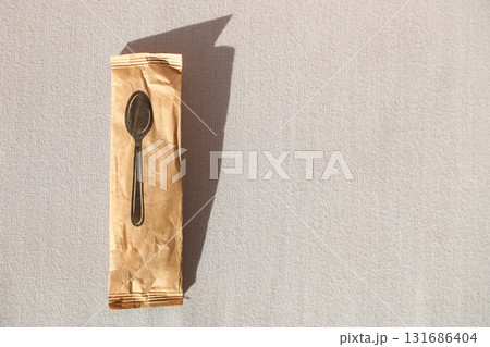 Eco-Friendly Disposable Wooden Spoon in Paper Packaging, Perfect for Sustainable Dining and Environmentally Conscious Events, Promoting Green Living Choices 131686404
