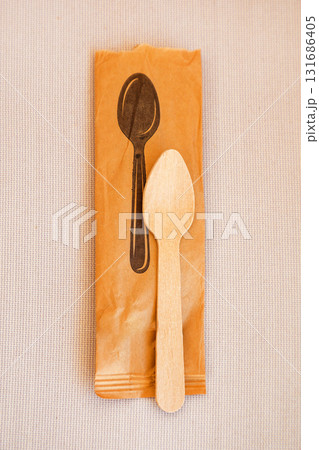 Eco-Friendly Disposable Wooden Spoon in Paper Packaging, Perfect for Sustainable Dining and Environmentally Conscious Events, Promoting Green Living Choices 131686405