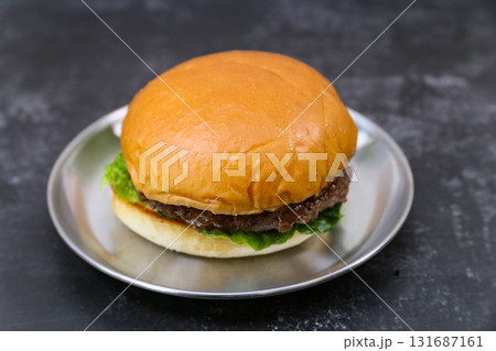 beef patty hamburger on a plate 131687161