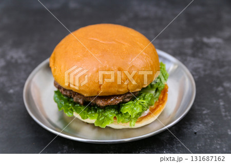 beef patty hamburger on a plate 131687162