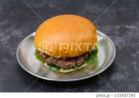 beef patty hamburger on a plate 131687165