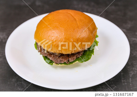 beef patty hamburger on a plate beef patty hamburger on a plate 131687167