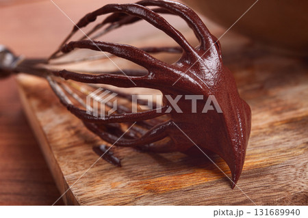metal whisk, close-up with chocolate dough , baking, structure and consistency, homemade, top view, no people, 131689940
