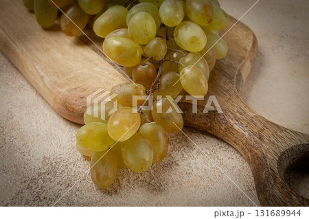 a branch of white grapes, wine grapes, Georgian grape variety Rkatsiteli, top view, 131689944