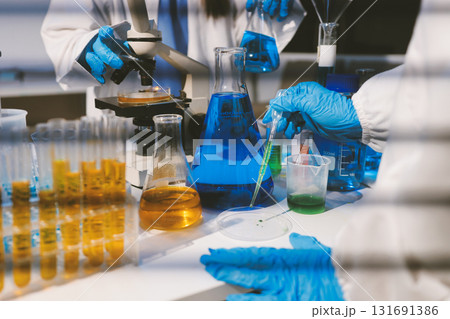 Researchers working in the clinical laboratory Researchers working in the clinical laboratory 131691386