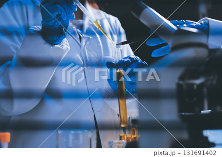 Researchers working in the clinical laboratory Researchers working in the clinical laboratory 131691402