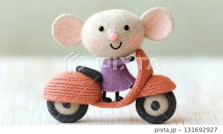 Adorable knitted mouse, wearing purple dress, enjoys leisurely ride on orange scooter Adorable knitted mouse, wearing purple dress, enjoys leisurely ride on orange scooter 131692927