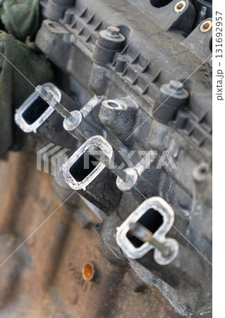 Car engine intake manifold during repair service 131692957