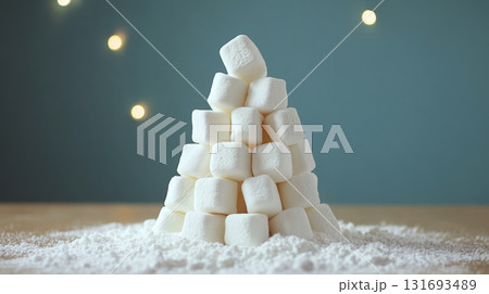 Marshmallows stacked in a pyramid on a wooden surface with bokeh lights in the background. Concept of sweetness and fun. For dessert photo. 131693489