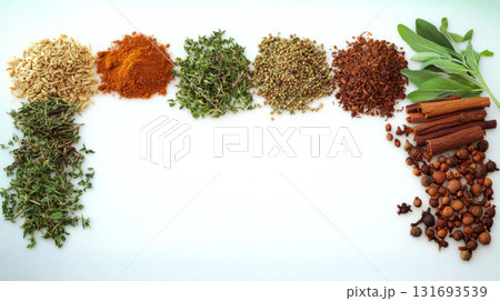 Various spices and herbs are arranged neatly in rows on a white surface. Concept of culinary diversity. For food and recipe illustrations. 131693539