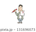 学校や塾でテストの採点をする教師(先生) 131696073