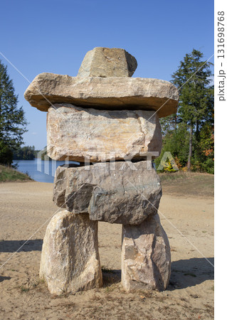 Inukshuk sculpture in Muskoka park, Canada. 131698768