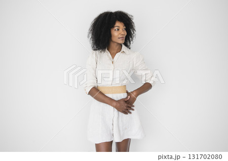 nice and cool Black American portrait female wearing suiton on white background 131702080