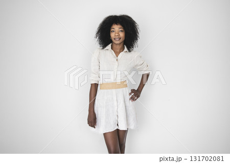nice and cool Black American portrait female wearing suiton on white background 131702081
