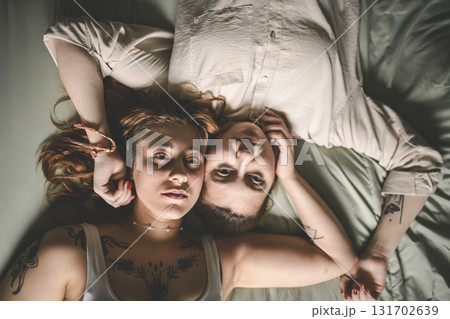 Happy couple having great time close to a window at home 131702639