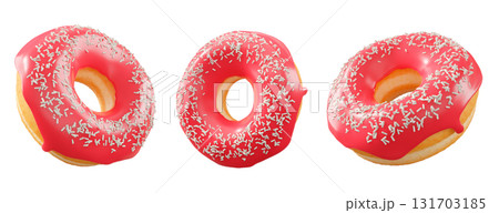 Donuts with red fruit glaze, sprinkles, white drizzle, and dots isolated on white transparent background 131703185