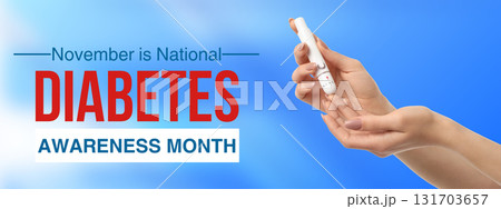 Hands holding a diabetes testing device with a blue background Hands holding a diabetes testing device with a blue background 131703657