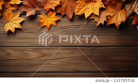 Autumn leaves frame on wooden background top view Autumn leaves frame on wooden background top view 131705518