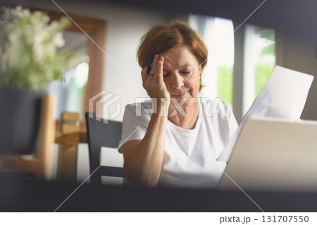 Sad frustrated senior woman pensioner having depressed look 131707550