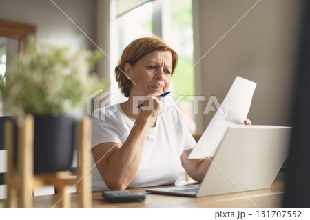 Sad frustrated senior woman pensioner having depressed look 131707552